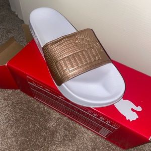 8.5 Puma slides (Never worn)